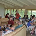 Group in hospitality suite at lodge.<br />